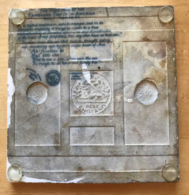 Image of the back of tile in Fig. 1, describing the subject (the Fairbanks House), manufacturer (Wedgwood) and importer (James McDuffee & Stratton Company)