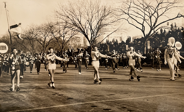 1961 photograph of Carbon Hill high school band marching along the streets of Washington, DC.