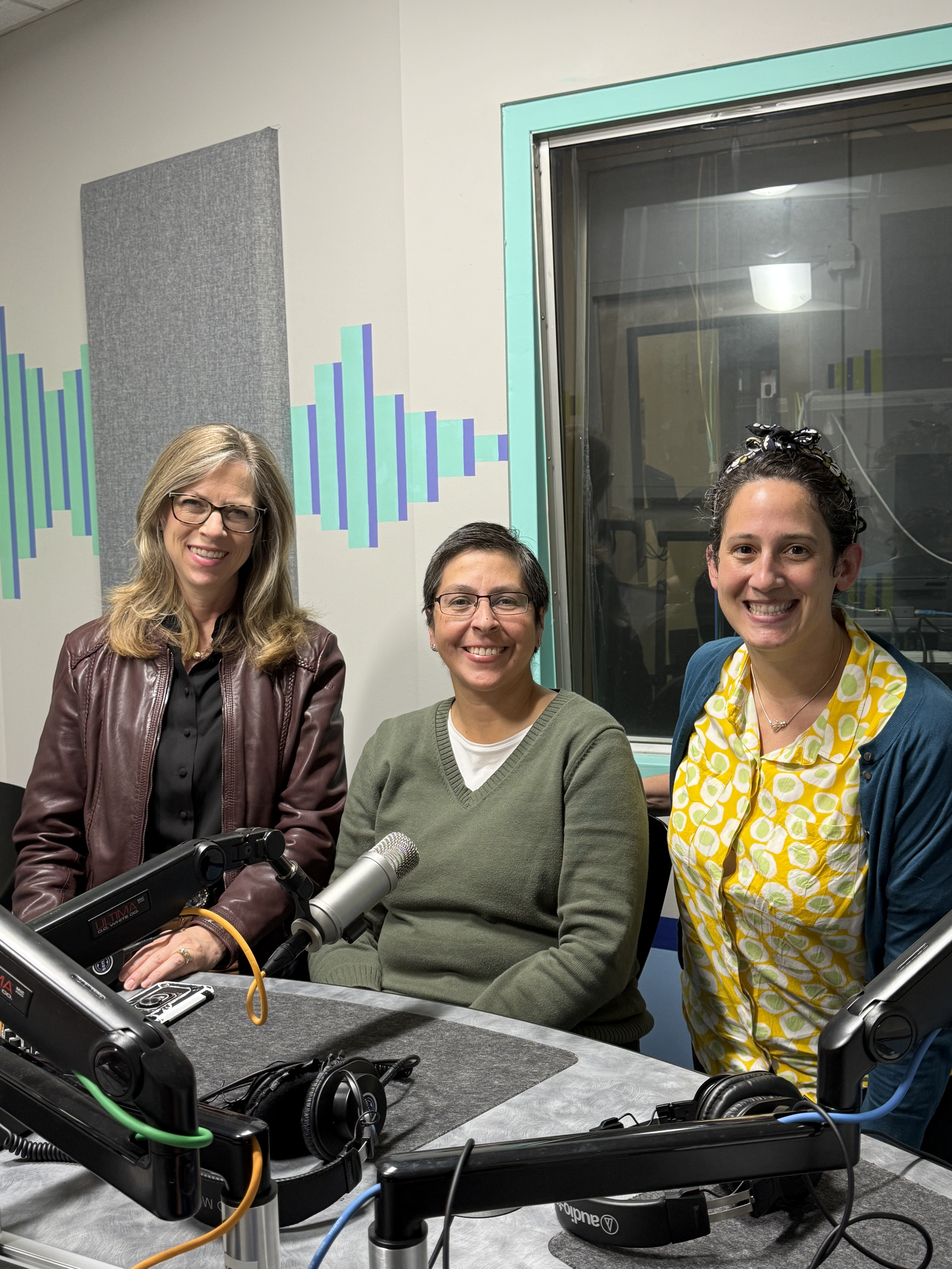 Michelle Amazeen, Ph.D, Tammy Vigil, Ph.D, and Charlotte Howell, Ph.D photographed in the podcast studio.