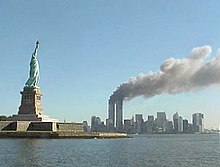220px-National_Park_Service_9-11_Statue_of_Liberty_and_WTC_fire