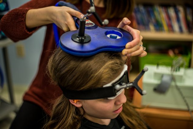 transcranial magnetic stimulation performed with a child
