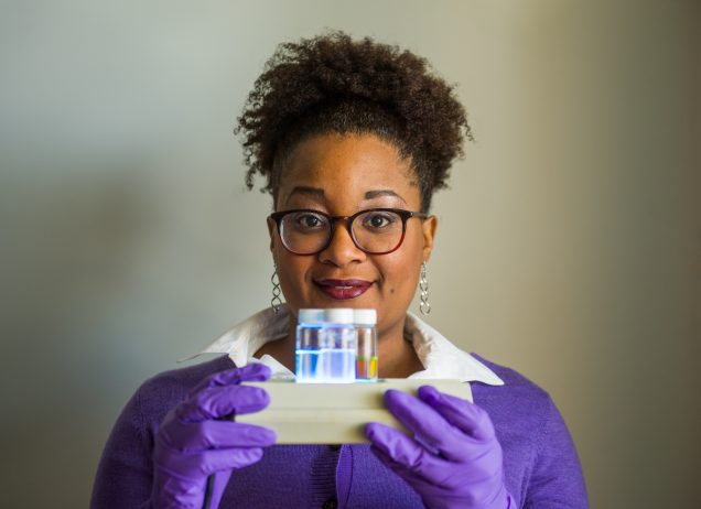 4/28/16 -- Boston, MA Materials scientist Malika Jeffries-EL holds conjugated molecules in her lab April 28, 2016. Photo by Cydney Scott for Boston University Photography