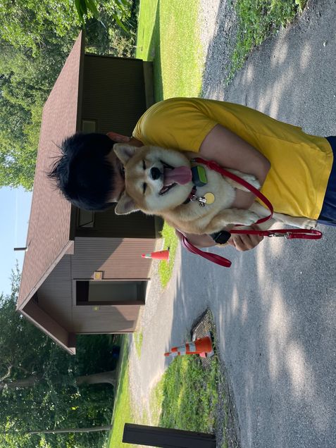 Guangqu Zheng with Douby in Marcellus park, Syracuse, NY, July 27, 2024