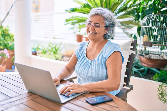 Participant completing a cognitive assessment on a tablet