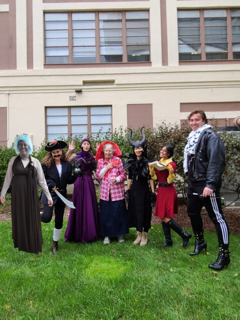 (left to right): Diane as Hades, Kim as Captain Hook, Alexandra as Yzma, Jeanne as Queen of Hearts, Guangmei as Maleficent, Emily as Gaston, Cameron as Cruella DeVil