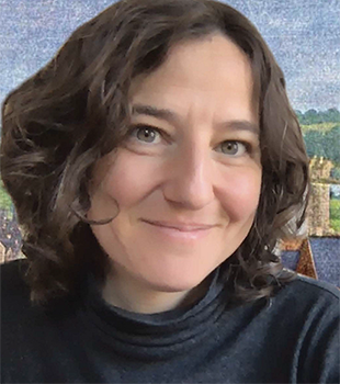 Irit Kleiman smiling portrait.