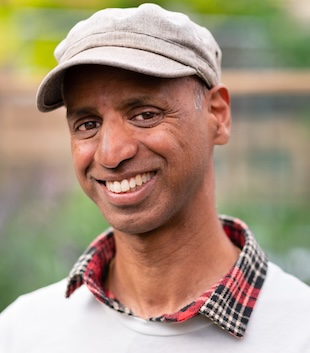 Kannan Thiruvengadam smiling portrait.