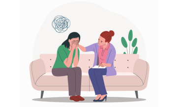 Illustration of a counselor sitting beside a distressed person on a couch, offering comfort as the person covers their face, with a scribble symbol above representing emotional distress.