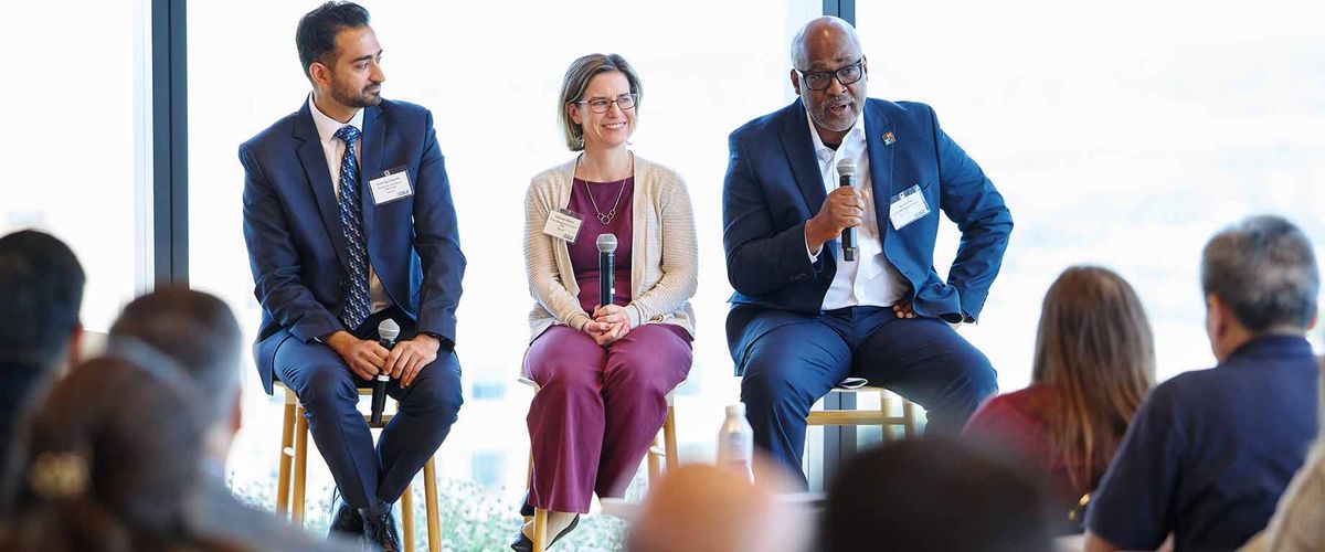 A panel of speakers presenting at the 2025 PMiP Conference