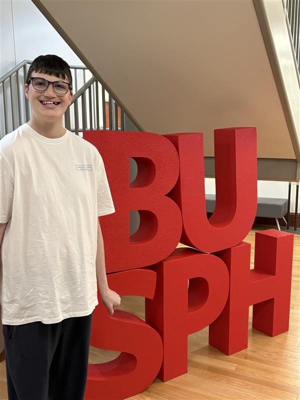 A photo of Dan O'Donnell in the lobby of BUSPH.