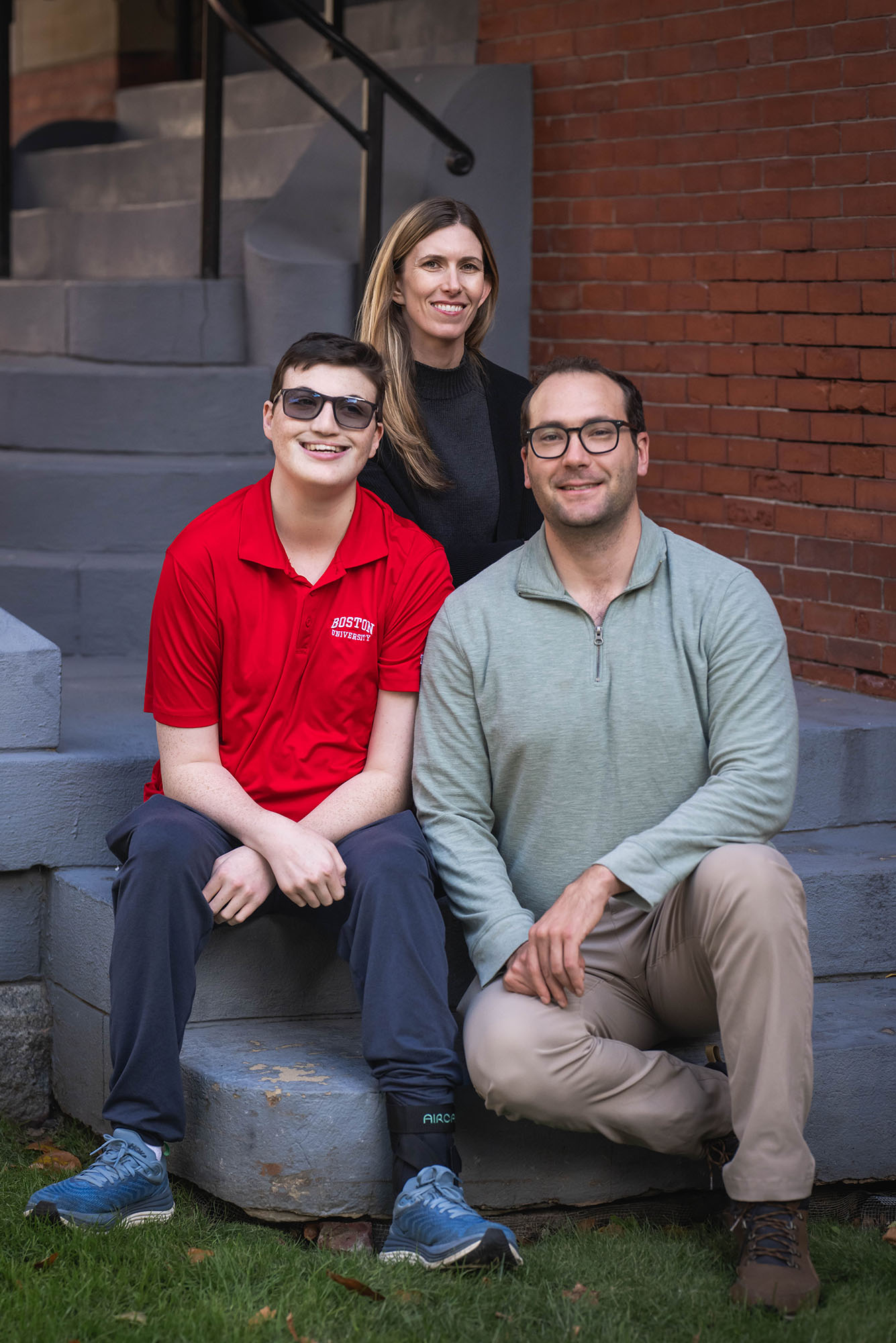 SPH Associate Professor of Epidemiology, Eric Rubenstein (right) Dan O'Donnell and lab manager Ashley Scott pose for a photo on October 23, 2025. His lab researches people with Down syndrome and other intellectual disabilities. Photo by Jackie Ricciardi for Boston University