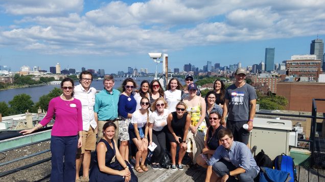 Our group in front of the Boston skyline atop the College of Arts and Sciences Building!