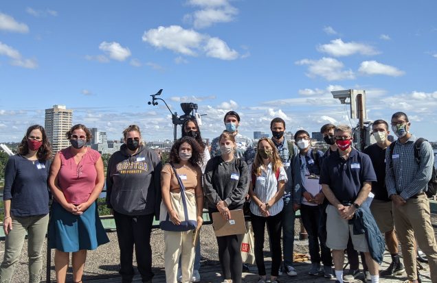 Group photo of students, faculty, and staff, wearing masks