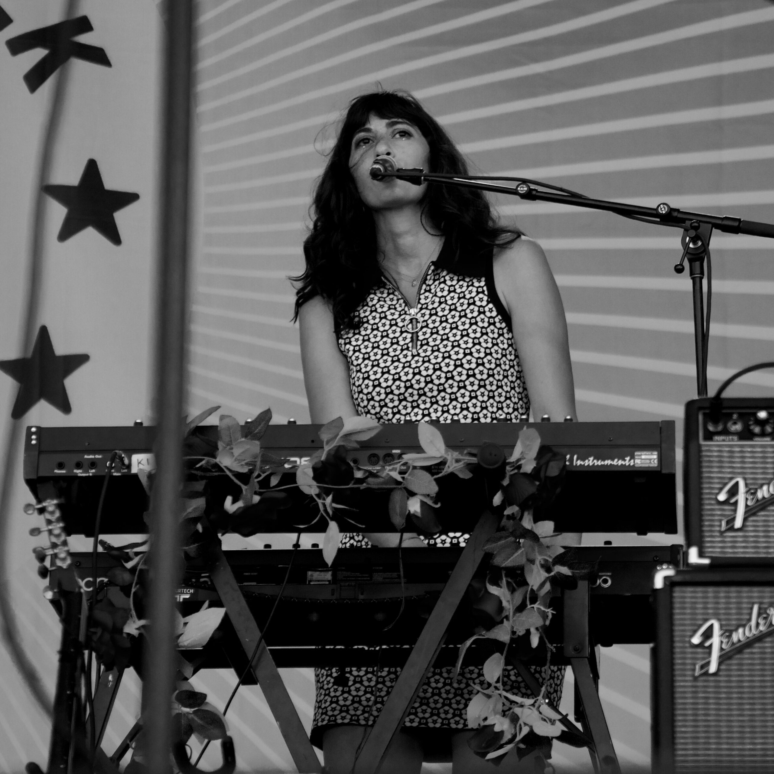 Sarah Goldstone plays the keyboard and sings with Lucy Dacus’ band at Newport Folk Festival in Newport, R.I. on July 23, 2022. (Maya Santow/WTBU)